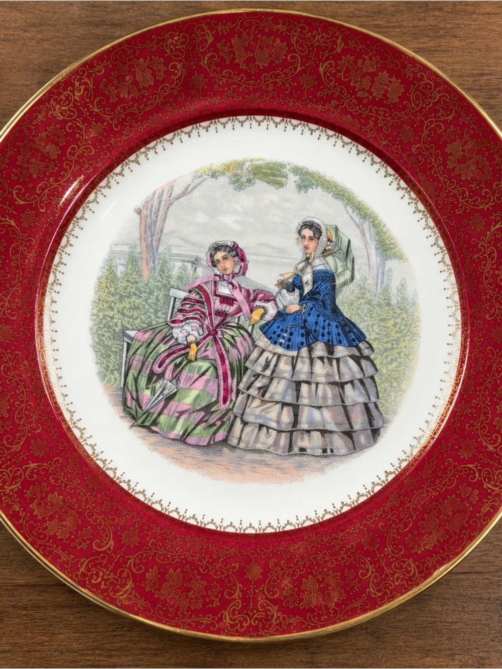 Decorative Red Accent Wall Plate with Victorian Scene